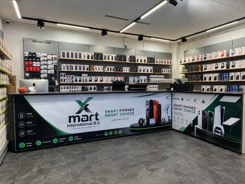 The sales counter with shelves full of accessories behind it